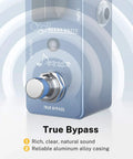 Close-up of blue Overdrive Guitar Pedal With Warm And Hot Modes Blues Drive Vintage Style Tone For Pedal Boards True Bypass Circuit Delivers Classic Tube Overdrive From Gentle Breakup To Screaming Leads, emphasis on true bypass footswitch and logo.