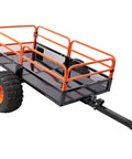 Heavy Duty 1500 Lb Dump Trailer For ATVs And UTVs With Solid Steel Bed And Removable Side Rails All Terrain Tires in profile view.