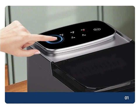 Top view of Premium Compact Countertop Electric Ice Maker With Effortless Manual And Automatic Settings, hand pressing control.