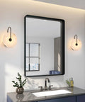 ELYCCUPA 10” Marble Wall Sconces Set of Two Matte Black Classic Stone Alabaster Wall Lights for Bedside Vanity Hallway, UL Listed, in a modern bathroom.