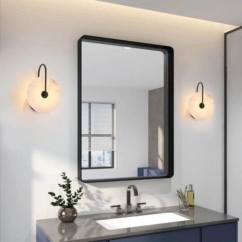 ELYCCUPA 10” Marble Wall Sconces Set of Two Matte Black Classic Stone Alabaster Wall Lights for Bedside Vanity Hallway, UL Listed, in a modern bathroom.