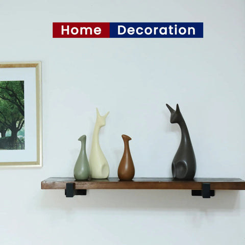 Beefy Five Millimeter Thick Heavy Duty Shelf Brackets Set Ten Inch Wall Mount Industrial Metal Black Iron Finish No Sag High Load Capacity Over One Hundred Eighty Pounds Per Pair supporting a shelf with decorative items against a white wall.
