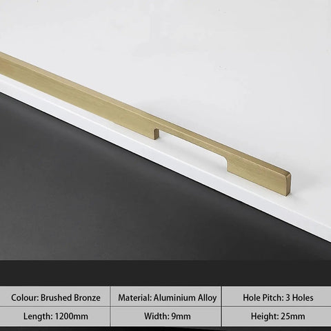 Close-up of brushed bronze aluminum alloy drawer handle, 1200mm long, shown on a white surface.