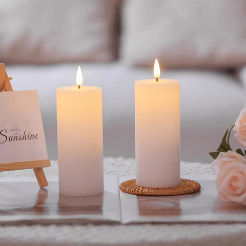 White Flameless Candles Set Of 2 2.2x5 Inch LED Pillar Candles With Remote, Timer, Battery Operated, Dimmable, on a table
