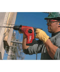 Worker using 6-Piece Carbide Drill Bit Set With Solid Carbide Head For Less Wear And Insane Precision on concrete wall