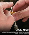 Hands using Air Conditioning Valve Core Kit For Most Cars With R12 R134a Compatible Cores And Teflon Seals Refrigeration Service Valves Removal Tool AC Repair Valves And HVAC System Charging Port Seal Cap Set