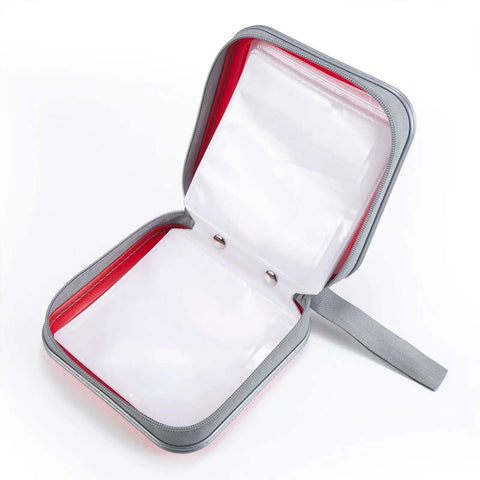 Open Slick Hard Plastic CD Case With Secure Slim Zipper Stores Forty Eight Discs Waterproof And Tough As Nails, showing storage pockets.