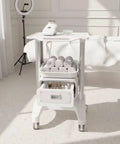 Straight Up Perfect Beauty Salon Cart Featuring Smooth Rolling Trolley Pull Out Drawer And Roomy Top Tray For Cosmetics with towels and equipment.