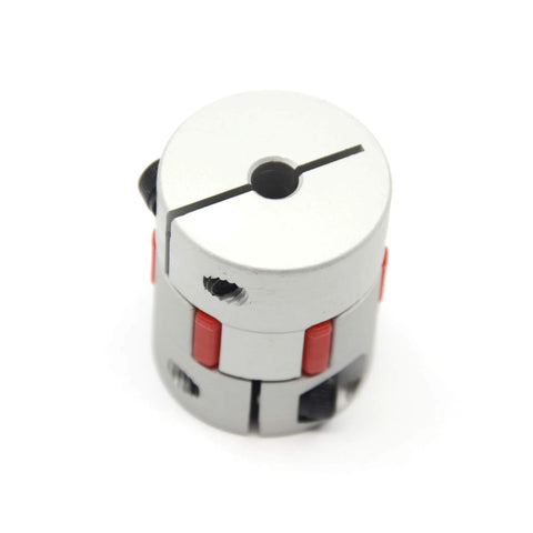 Close-up of aluminum two-piece shaft coupling for 5–8 mm shafts; 25 mm diameter, 30 mm length with red clamps