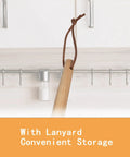 Wood-handled tool from 4 Piece Stainless Steel BBQ Grill Utensil Set With Wood Handles, lanyard hanging in kitchen
