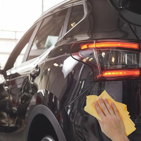 Person using Scratch Remover Wax For Deep Scratches On Clear Coat Auto Finish With Wipe And Sponge Universal Car Scratch Repair Paste on car