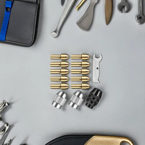 Copper Collet Chuck Set With Nut For Grinders And Drill Presses, 32 Piece Die Collet Kit, arranged with tools on a gray background
