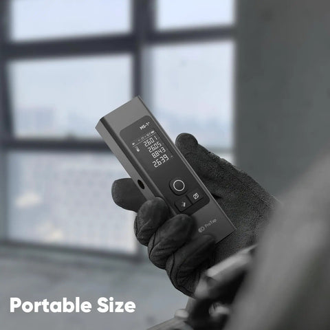 ProTap 2-in-1 Laser Measure & Line Laser 393 FT - Distance Meter held in gloved hand, portable size with LCD display.