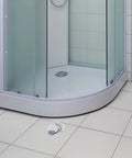 Premium Glass Door Hinge With 180 Degree Fixed Clamp For Frameless Showers And Kitchen Cabinets on floor near shower.