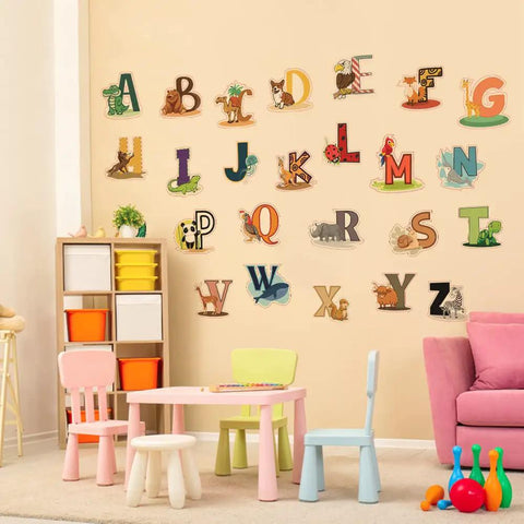 Colorful Alphabet Wall Decals For Kids Peel And Stick ABC Stickers For Kindergarten Playroom Nursery Preschool Tots Precut Educational Wall Art For Baby Rooms displayed on a playroom wall.