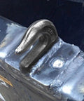 5/16 Inch Weld-On Grade 70 Grab Hook installed on flatbed trailer, heavy-duty steel, showing secure welding attachment