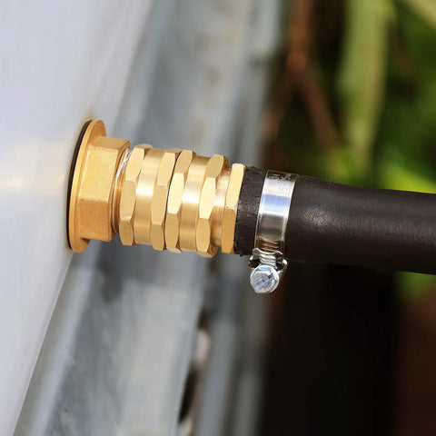 Garden Hose Adapter Female To Female 3/4 Inch GHT Brass Connector, Double Female Hose Fittings With Washers And PTFE Tape, Rustproof, No Fuss Easy Install For Outdoor Watering And DIY Plumbing. Brass connector attached to hose on outdoor fixture.
