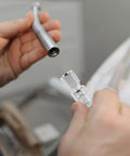 Heavy Duty Workhorse Stainless Steel Air Hose Coupler Quick Connect Pneumatic Fitting being fitted by hand in workshop.