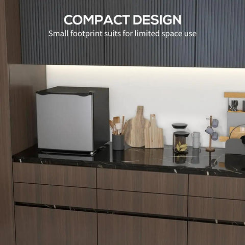 Real Deal 1.1 Cubic Foot Upright Mini Freezer With Quick Dial Thermostat and Smooth Reversible Door in compact kitchen setting.