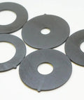 Rock Solid Insert Ring Set For Router Table Upgrade Hella Durable with five durable black rings, sizes 0.5 to 1.5 inches, woodworking accessory.