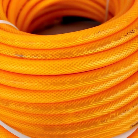 1/4 Inch By 100 Feet Hybrid Polymer Air Hose With Bend Restrictors Ultra Lightweight coiled in orange, ideal for heavy duty compressor use.
