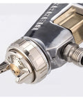 Close-up of Pro Grade Stainless Steel Pressure Feed Sand Blaster And Paint Spray Gun With Precision Fine Tuning Control nozzle and body.