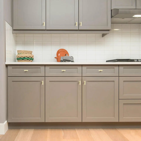 Top Shelf Brushed Gold Cabinet Handles Hella Sturdy Single Hole Drawer Pulls Two Inch Long Solid Zinc Hardware No Nonsense Thirty Pack For Slick Kitchen And Bath Renovations on gray kitchen cabinets.