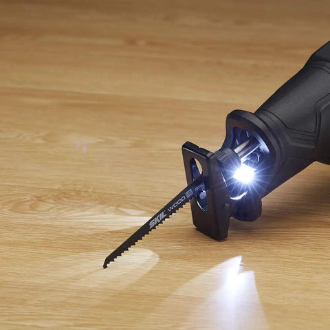 Cordless Reciprocating Saw Kit With Brushless 20V PWR CORE 20 Battery showing blade and LED light on wooden surface