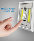 Person using manual switch on Bright 200 Lumen Cordless COB LED Night Light With Magnetic Mounts And No Wires Needed Battery Operated Easy Install