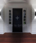 Lit Up And Down Outdoor LED Wall Lights With 5 CCT Adjustable 2700K To 5000K on white facade, illuminating double door