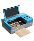 OMTech K40+ 45W CO2 laser engraver, blue/gray desktop unit with 12x8 in engraving bed.