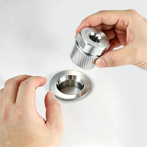 1.5 Inch Tub Drain Extractor For Quick Removal Of Broken Rusted Or Stubborn Drains Heavy Duty Hardened Steel With Gold Plated Finish Easy Grip Design For Home DIY Pipe Repair Plumbing Tool For Clear Clogs And Fast Fixes shown in hand with shiny finish