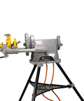 Reconditioned Heavy Duty Pipe Threading Machine With Foot Pedal And Quick Opening Die Head Handles Half Inch To Two Inch Pipe on a stable stand.