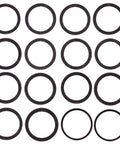 Dub MTB Road V3 Bottom Bracket Spacer Kit With Aluminum Spacers arranged in grid, showcasing variety of spacer sizes for precise fit.