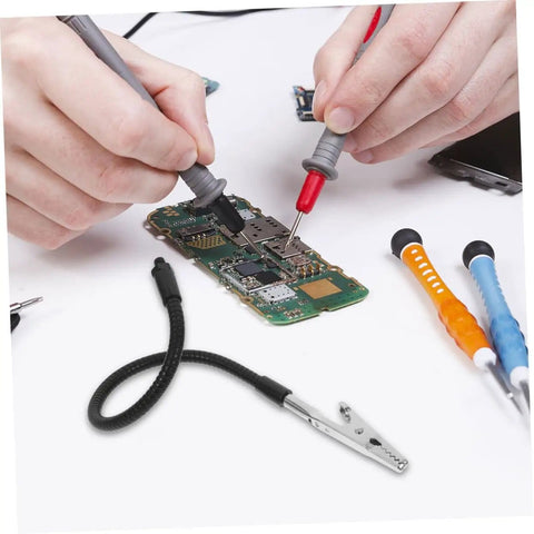 Hands using soldering tools with Six Piece Soldering Clamp Adjustable Welding Fixture With Magnifying Glass Lamp Clamp For PCB Board DIY