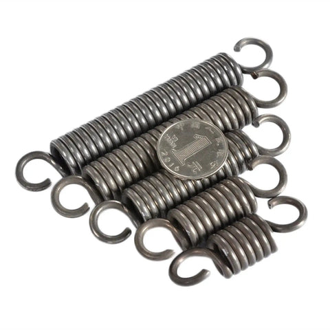 Extension Compression Springs Kit With 1.2mm Wire Diameter And 12mm Outer Diameter, shown with coin for size comparison