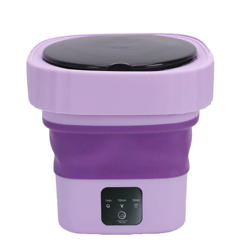Collapsible Mini Washing Machine With Six Liters And Dual Cycle Options Great For Dorms Or Rvs in lilac color with control panel.