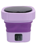 Collapsible Mini Washing Machine With Six Liters And Dual Cycle Options Great For Dorms Or Rvs Easy To Snap Down And Grab On The Go With Hidden Carry Handle For Quick Storage in purple with control panel.