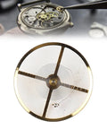 Pro Grade 7120 Balance Wheel Kit For Watch Repair And Movement Tinkering, Durable Alloy Parts resting on watch mechanism