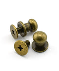 30 Pack Brass Head Chicago Screws With Nickel Plating, three slotted round head binding posts on white background.