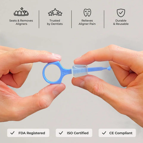All In One Invisalign Aligner Removal Tool With Built In Chewies Pack Of 2 Easy Removal And Perfect Seat For Aligners Retainers And Trays Patented 2 In 1 Design For Cleaner Wear And Secure Fit. Blue plastic aligner tool shown in hands