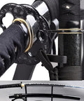 Practice Katana Sword with Full Tang Aluminum Steel Blade Blunt Edge for Safe Iaido Training close-up on hilt and blade