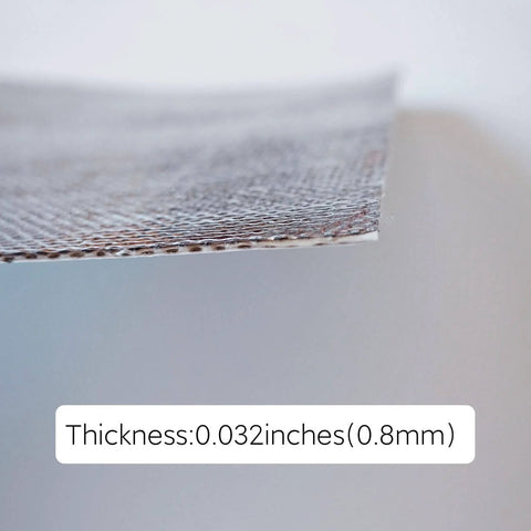 Close-up of Self-Adhesive Aluminum-Fiberglass Heat Shield Wrap thickness 0.032 inches, shows texture and edge detail.