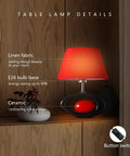 Red Modern Table Lamp With Ceramic Body And Linen Shade, LED Desk Light For Home And Office on wooden shelf