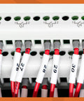 Heavy Duty 3/4 Inch Heat Shrink Label Tubes 18057 on red and gray cables, providing clear identification for electrical wiring.