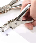 Metal Handheld Hole Puncher With 3Mm And 6Mm Circular Holes punching paper, durable steel build, ideal for office and DIY tasks