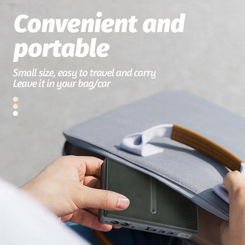 Hand holding portable Rock Solid 18W DC UPS Power Backup, compact size fits easily in bags for routers and PoE cameras.