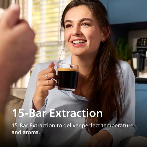 Woman smiling holding a glass of coffee with 1200 Series Fully Automatic Espresso Machine With Classic Milk Frother Ceramic Grinder in background