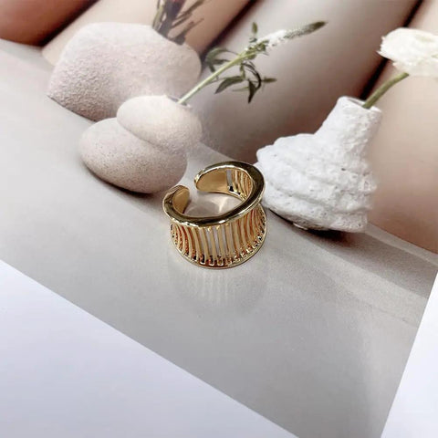 Fresh Vintage Wide Cuff Open Ring For Women Featuring A Bold Hollow Geometric Grid And Striped Texture, on a styled surface.