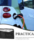 Top Shelf Outdoor Electric Vehicle Charger Cover Built Different With Heavy Duty Waterproof Cloth Shield For Tesla Wall Connector Level Two Port Guard Keeps Your Charge Cable Dry During Slick Rain Mess, showcasing the cover on an EV charging.